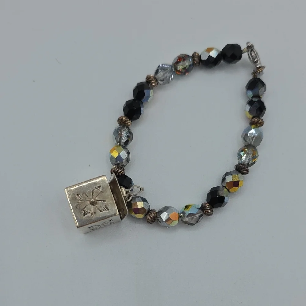 Elegant Black and Gold Charm Bracelet